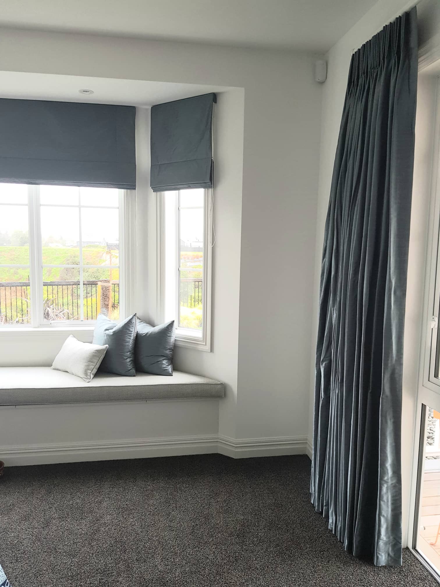 Drapes and blinds in lounge room